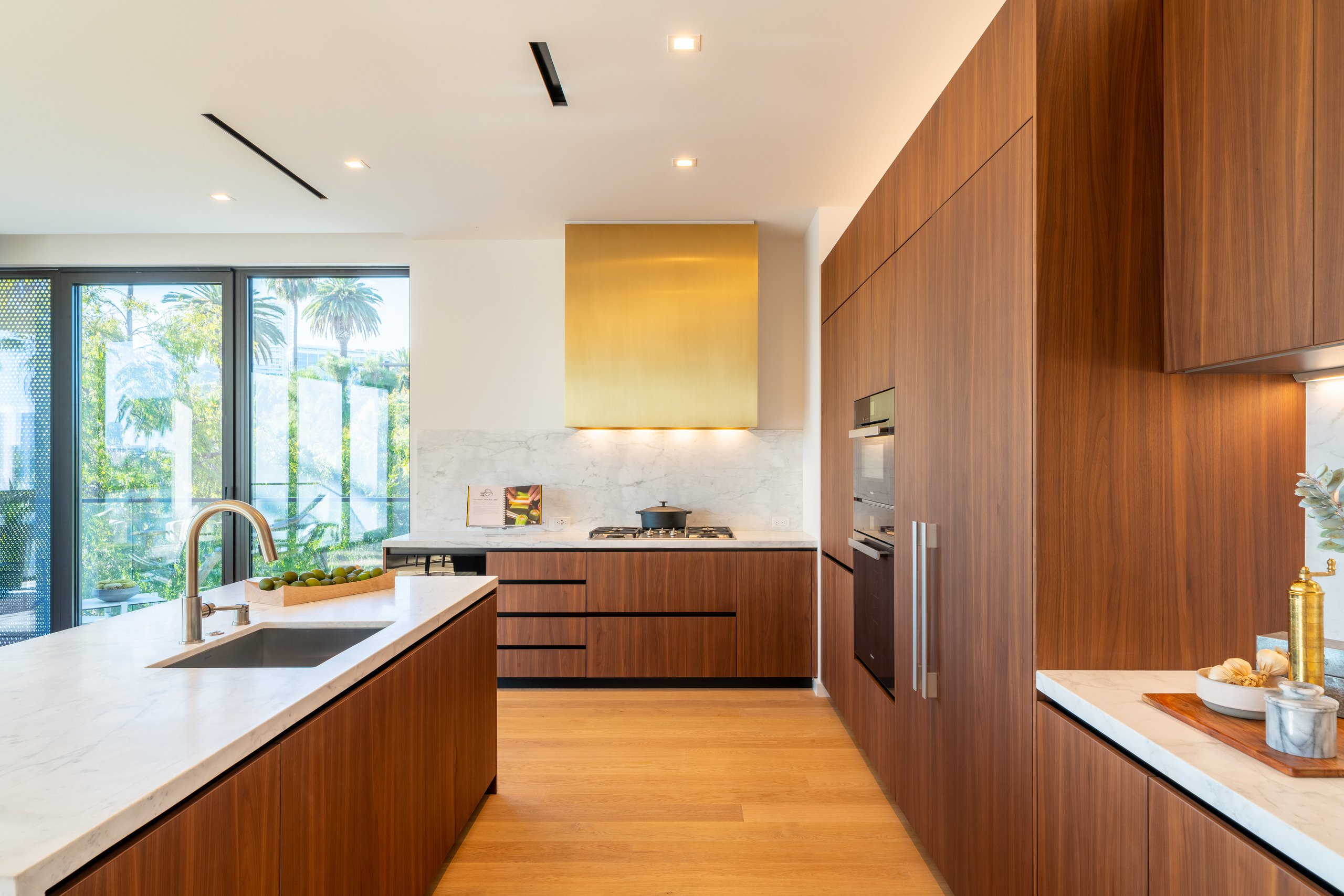 A photo of a penthouse kitchen by Poliform at The Harland